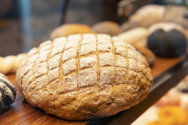 istock Tasty bread in a food shelf in the Bakery 1268733457