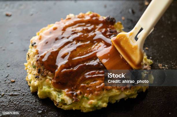 Okonomiyaki Japanese Teppanyaki Pancake Stock Photo - Download Image Now - Sauce, Okonomiyaki, Asia