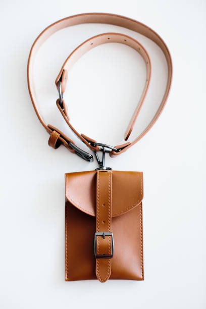 istock Brown waist bag with belt, isolated on white background 1268744997