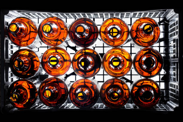 Empty beer amber bottle box with backlit aerial view