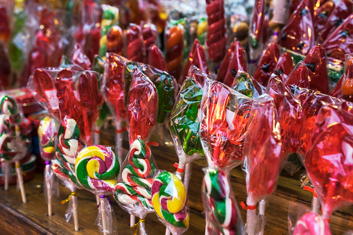 multi-colored lollipops sold at the Christmas market. candy close up