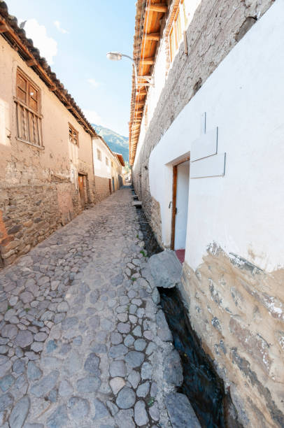 istock Narrow Cobbled Street In Ollantaytambo, Peru 1268787942