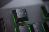 Esc computer key on black computer keyboard