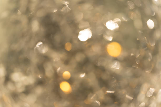 istock bright christmas bokeh. iridescent glare silver 1268792266