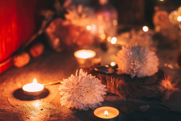 istock Mysterious halloween scene, witchcraft practicing, ritual candles. Fairytale, fairies theme, gemstones, flowers, love magic, white magic 1268805605