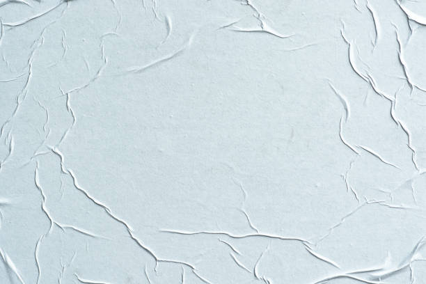 istock Crumpled white paper. Abstract background for design. 1268815028