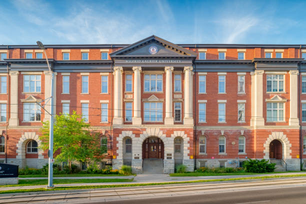 Wilfrid Laurier University Kitchener campus Ontario Canada Wilfrid Laurier University building in downtown Kitchener Ontario Canada on a sunny day wilfrid laurier stock pictures, royalty-free photos & images