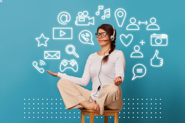 istock Woman levitates in lotus position with headset. 1268846377