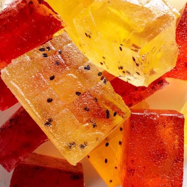 istock pieces of marmalade red and yellow on a light  background 1268859821