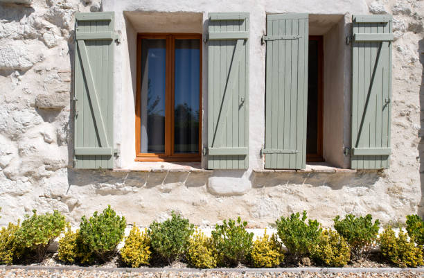 istock open wooden window shutters 1268861561