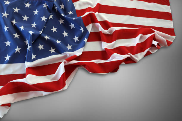 istock USA flag on grey 1268861563