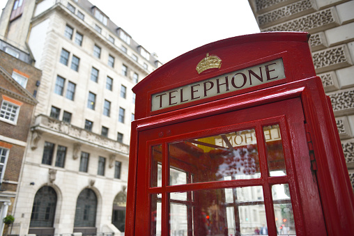 Traditional Red English Telephone box cabinet, London, England