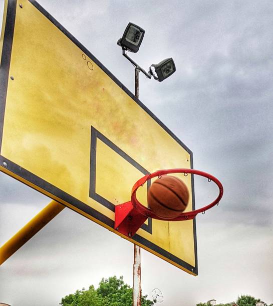 istock Passing the ball through the basket without a net 1268881878