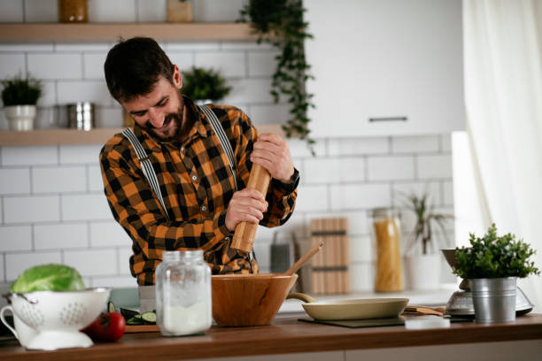 istock Young man preparing delicious food. 1268888913