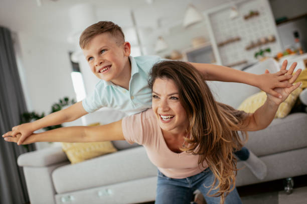 istock Mom and son having fun at home. 1268894559