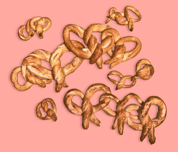 Interlocked pretzels of various sizes on solid background