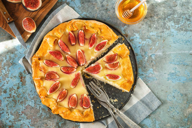 istock Freshly baked fig galette or open fig pie on rustic background 1268900823