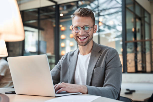 istock Excited worker sitting at the desk in coworking space 1268901043