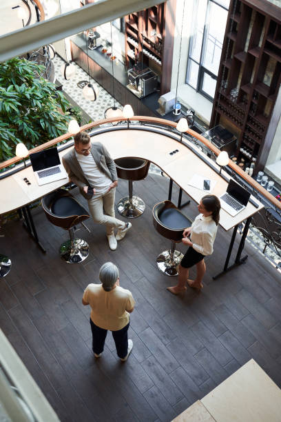 istock Two young people and a senior woman in a nice lounge 1268901671