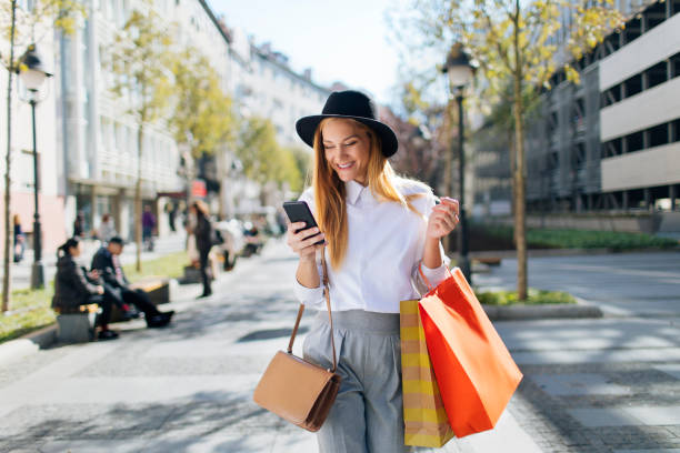 istock Checking all the sales on her phone 1268903234