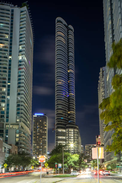 Night photo of Brickell Flatiron Building Miami, FL, USA - August 25, 2020: Night photo of Brickell Flatiron Building real estate outdoors vertical usa stock pictures, royalty-free photos & images