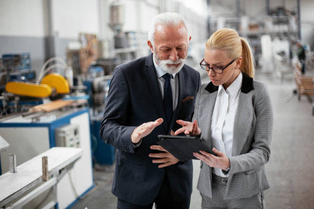 istock Colleagues working in factory 1268905146