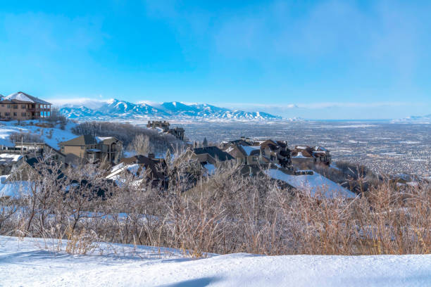 istock Mountain houses with panoramic views of sweeping valley and towering peaks 1268905147