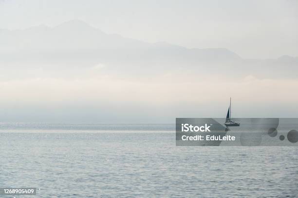 Sailboat On A Foggy Morning Stock Photo - Download Image Now - Desaturated, Morning, Brazil