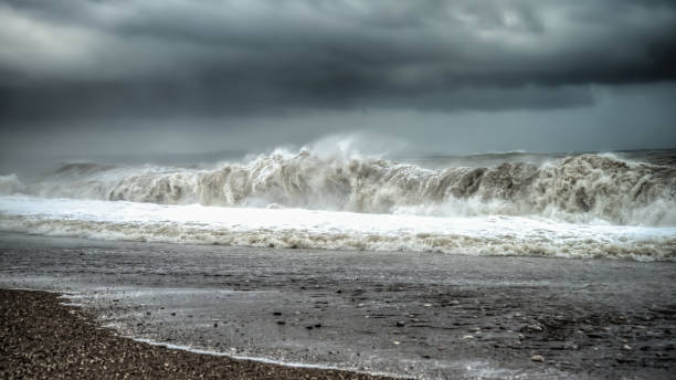 istock Sea waves with splash during a stormy weather 1268906689