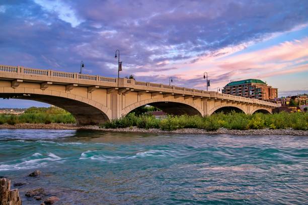 istock Bridge Crossing The Bow River At Sunrise 1268906862