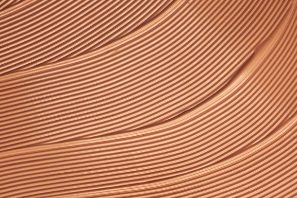 istock Smudged chocolate beige pink cosmetic make-up gradient texture palette creamy matte concealer foundation CC or BB-cream powder 1268911516