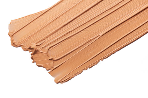 istock Smudged cosmetic make-up gradient texture palette creamy matte concealer foundation CC or BB-cream powder on white isolated background 1268912270