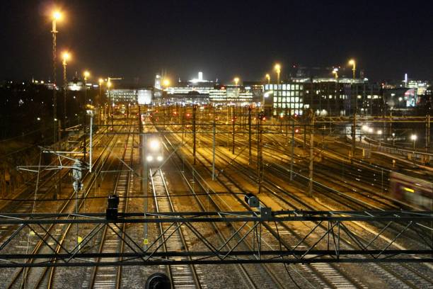 istock Railway Tracks at a Major Train Station in night. 1268912673