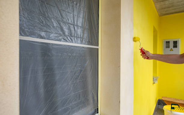 istock Protected Window With Plastic Due to House Facade Painting 1268916270