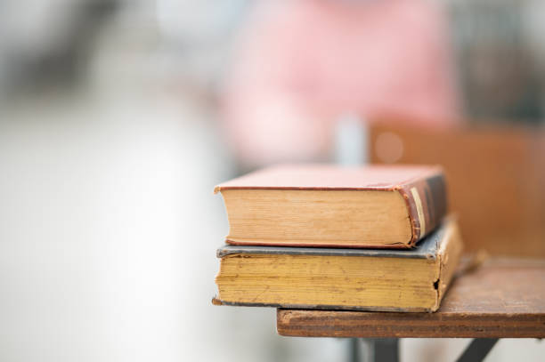 istock Books on the table in the classroom at the university 1268923544