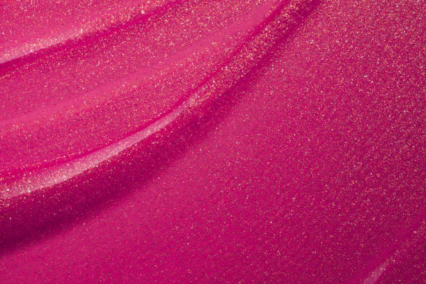 ピンクの赤紫オレンジクラレットマルーン光沢のある80年代のリップグロス - beautiful glamour motion purple ストックフォトと画像