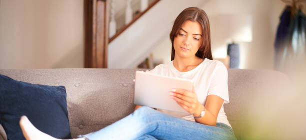 istock young woman  with her tablet 1268931380