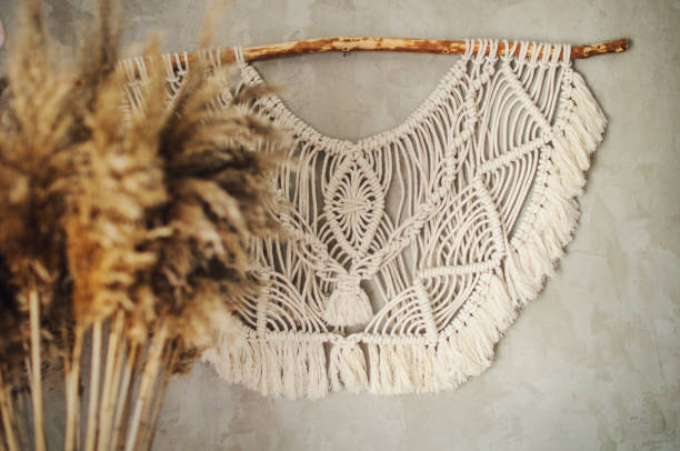 istock Beautiful boho macrame wall panel will add a cozy atmosphere and charm to any space in your home 1268932279