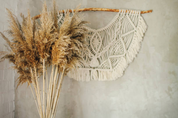 istock Beautiful boho macrame wall panel will add a cozy atmosphere and charm to any space in your home 1268932292