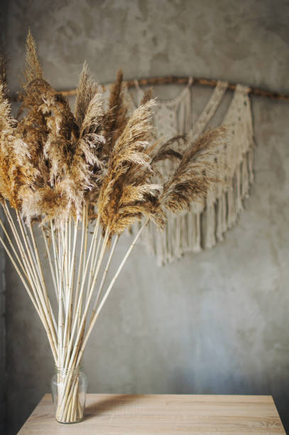 istock Beautiful boho macrame wall panel will add a cozy atmosphere and charm to any space in your home 1268932303
