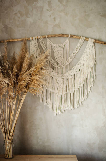 istock Beautiful boho macrame wall panel will add a cozy atmosphere and charm to any space in your home 1268932386