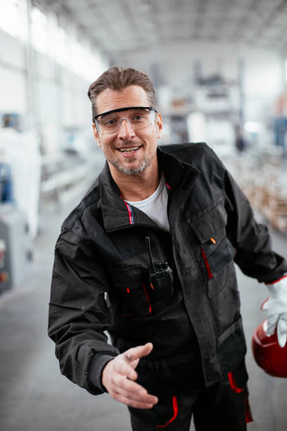istock Man handshake in factory. 1268938793