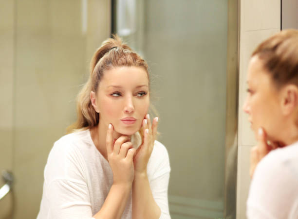 istock Magic anti-aging cream.Applying the cream 1268945837