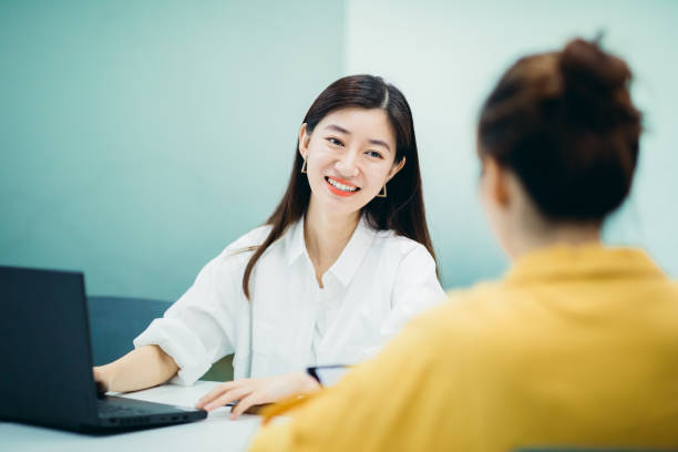 istock Two Businesswomen working together in office. 1268957906