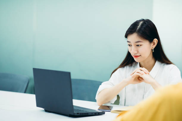 istock Two Businesswomen working together in office. 1268958078