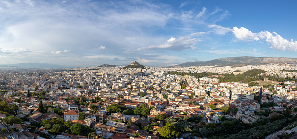 Looking down over Athens from a hill top during a sunny day.