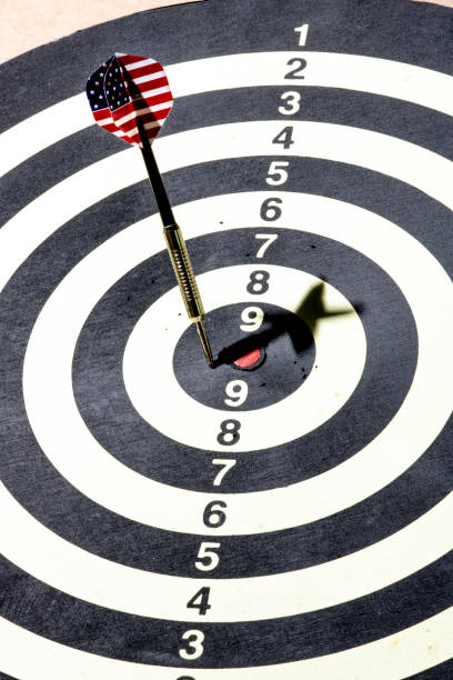 istock Dart with American USA flag board with darts in aim, with selective focus 1268983318