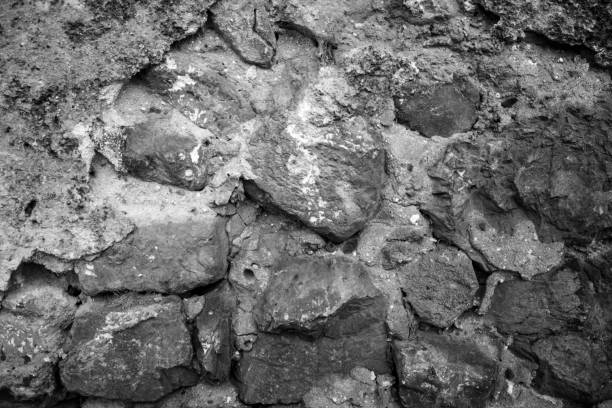 istock black and white texture of ancient wall with some internal cracks 1268990484