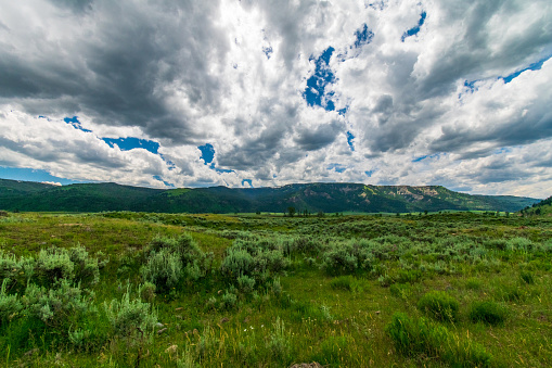 Afternoon clouds roll across Lamar Valley in Yellowstone National Park