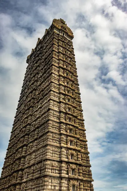 murdeshwar temple raja gopuram entrance with flat sky image is take at murdeshwar karnataka india at early morning. it is one of the tallest gopuram or temple entrance gate in the world.